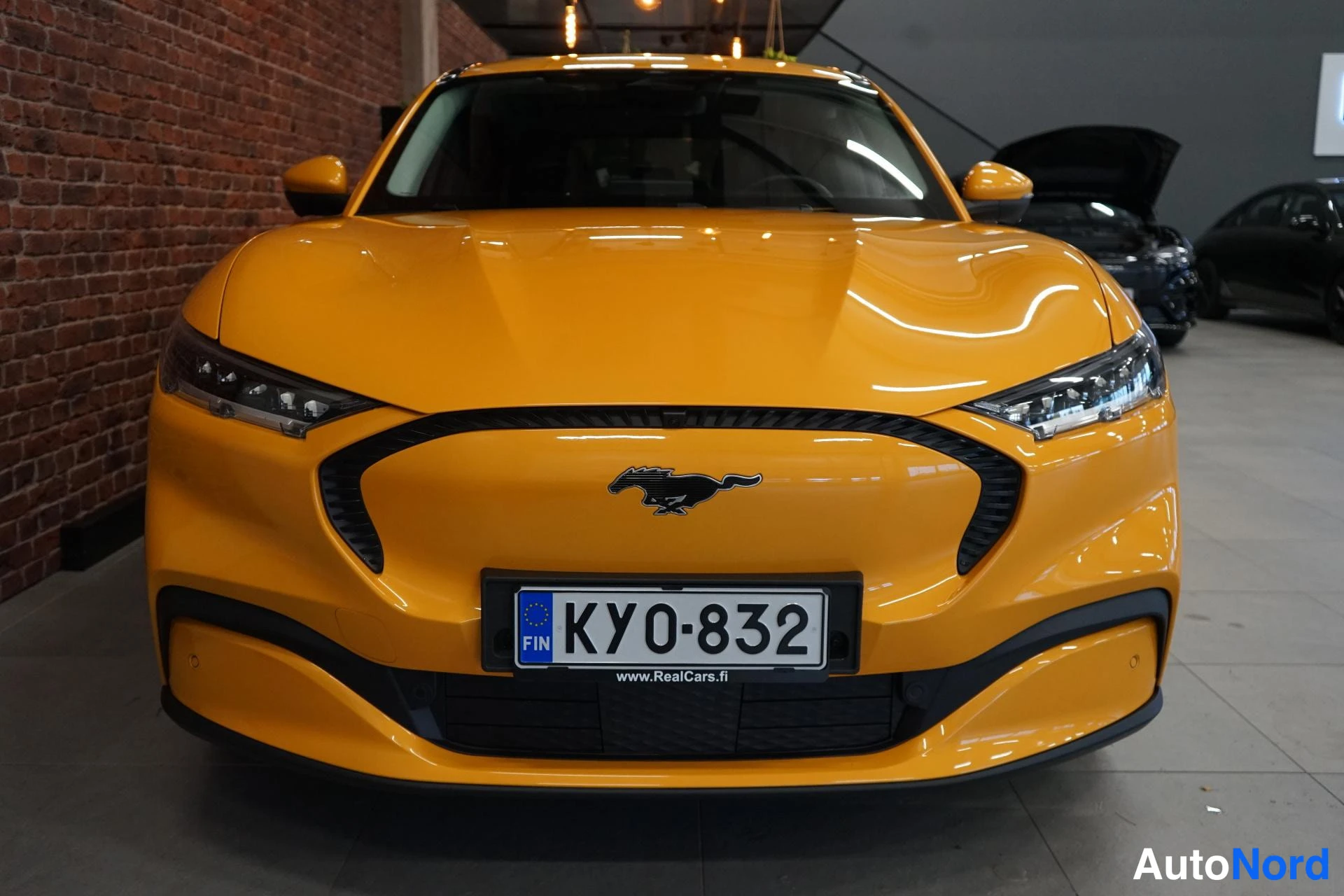 Yellow Ford Mustang Mach-E 2022, front, photo 2