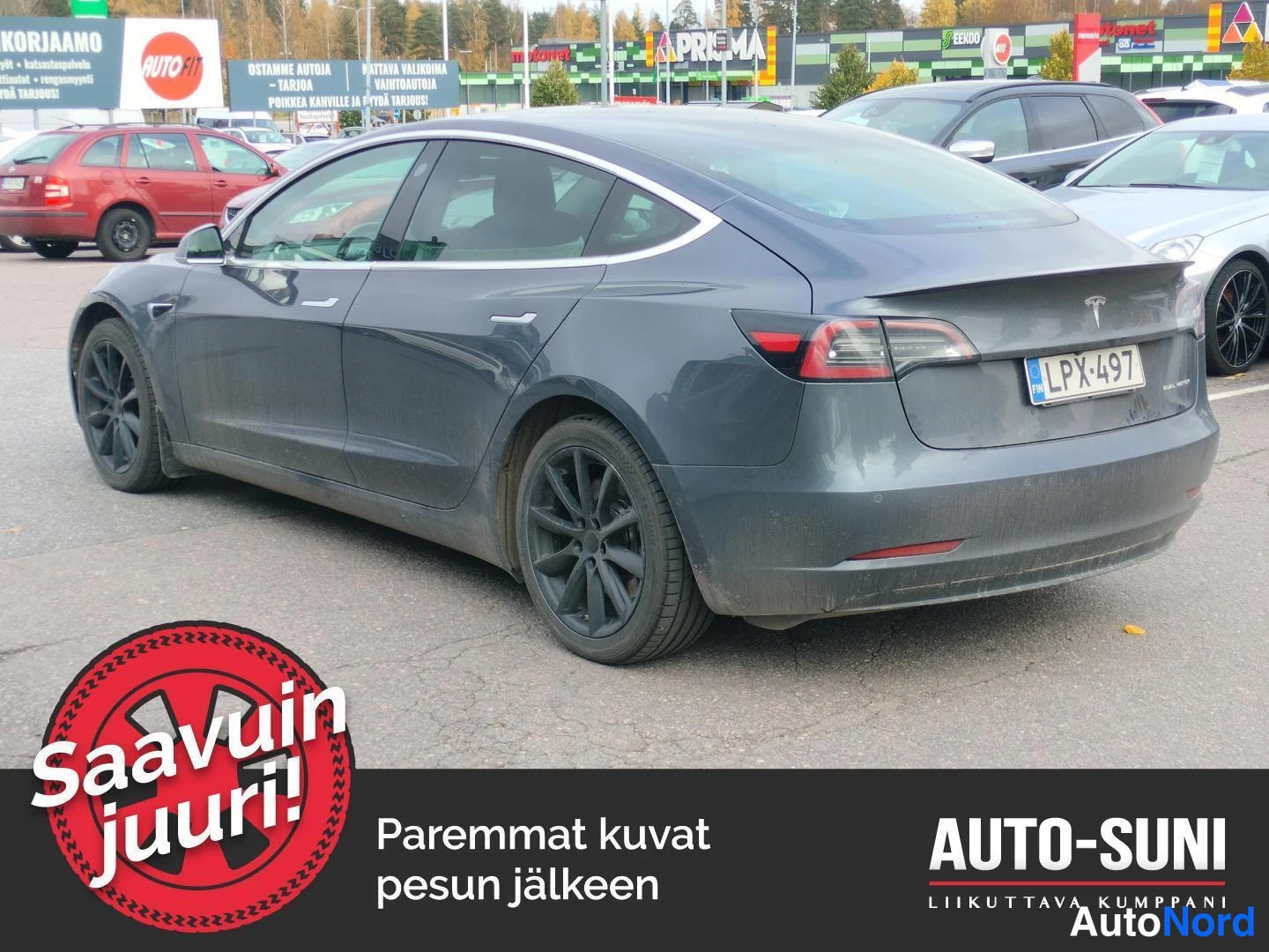 Harmaa Tesla Model 3 2019, takaviisto, kuva 3