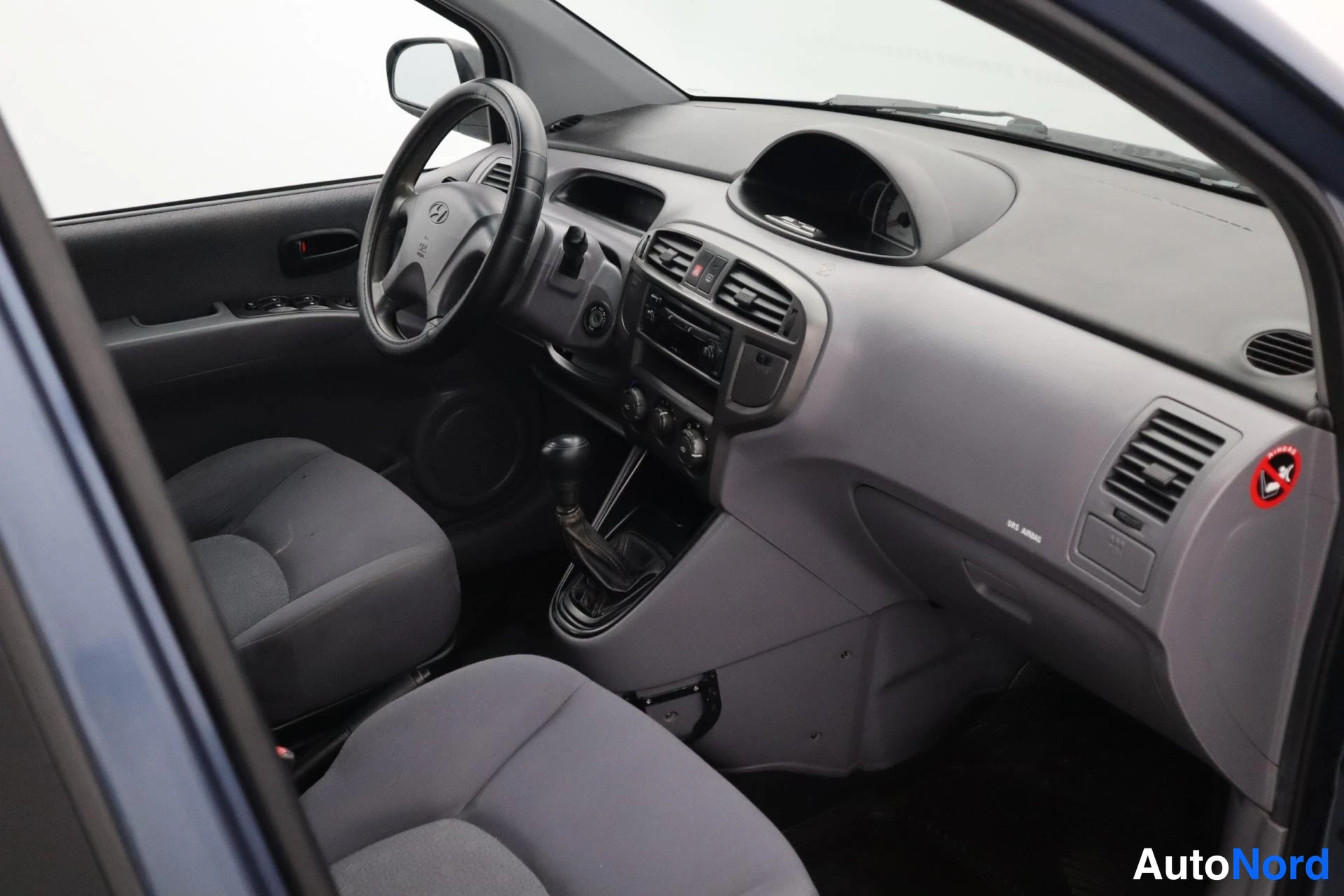 Sininen Hyundai Matrix 2005, kuva 11