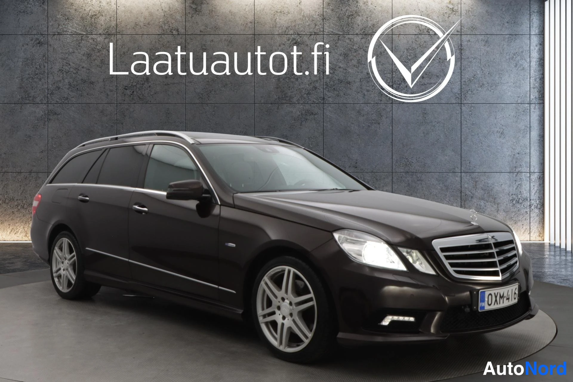 Brown Mercedes-Benz E 2009, front three-quarter, nose to the right, photo 2