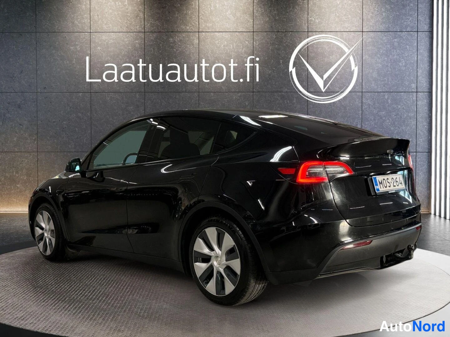 Black Tesla Model Y 2023, rear three-quarter, photo 5
