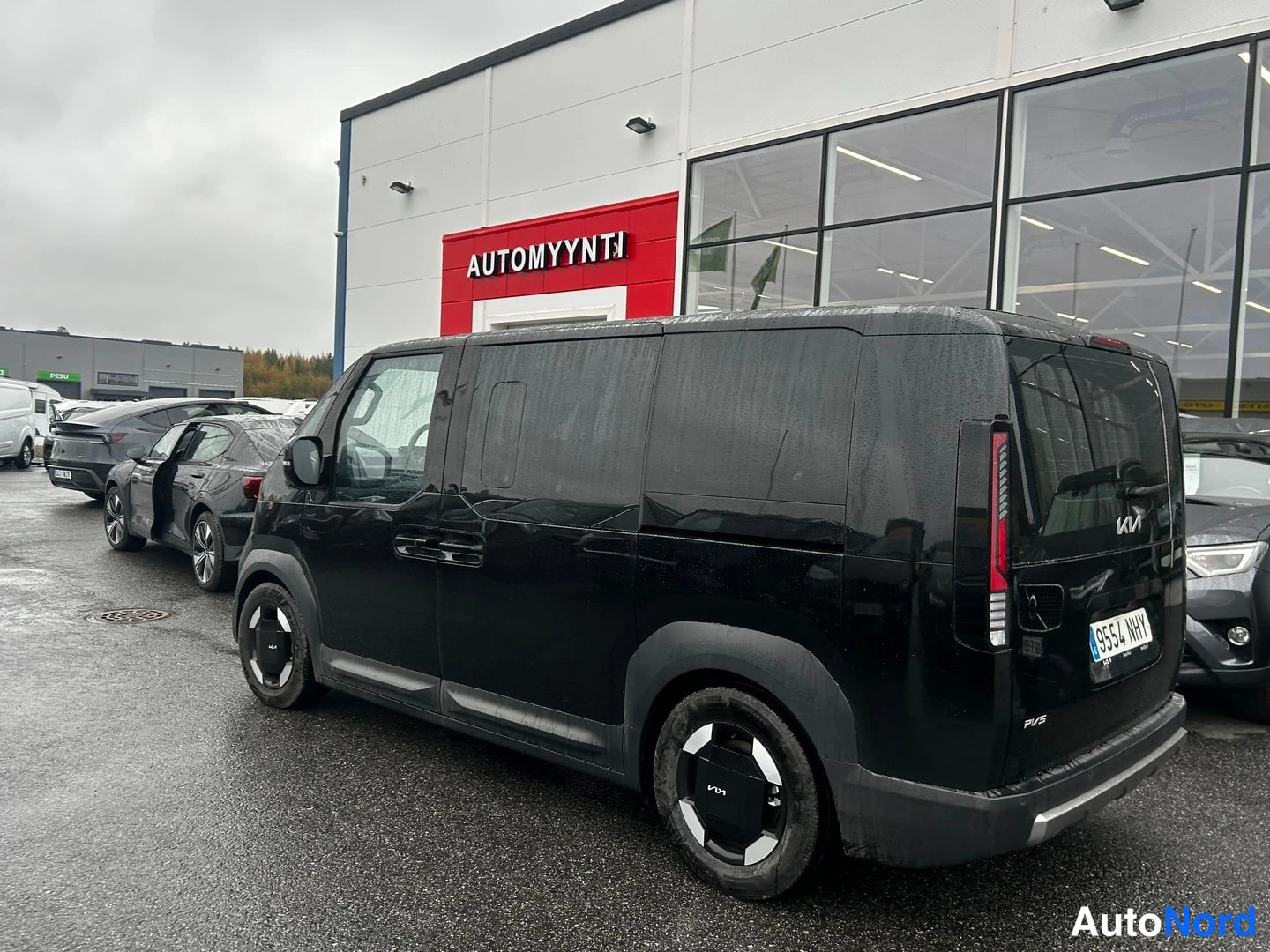Black KIA PV5 2026, rear three-quarter, photo 5