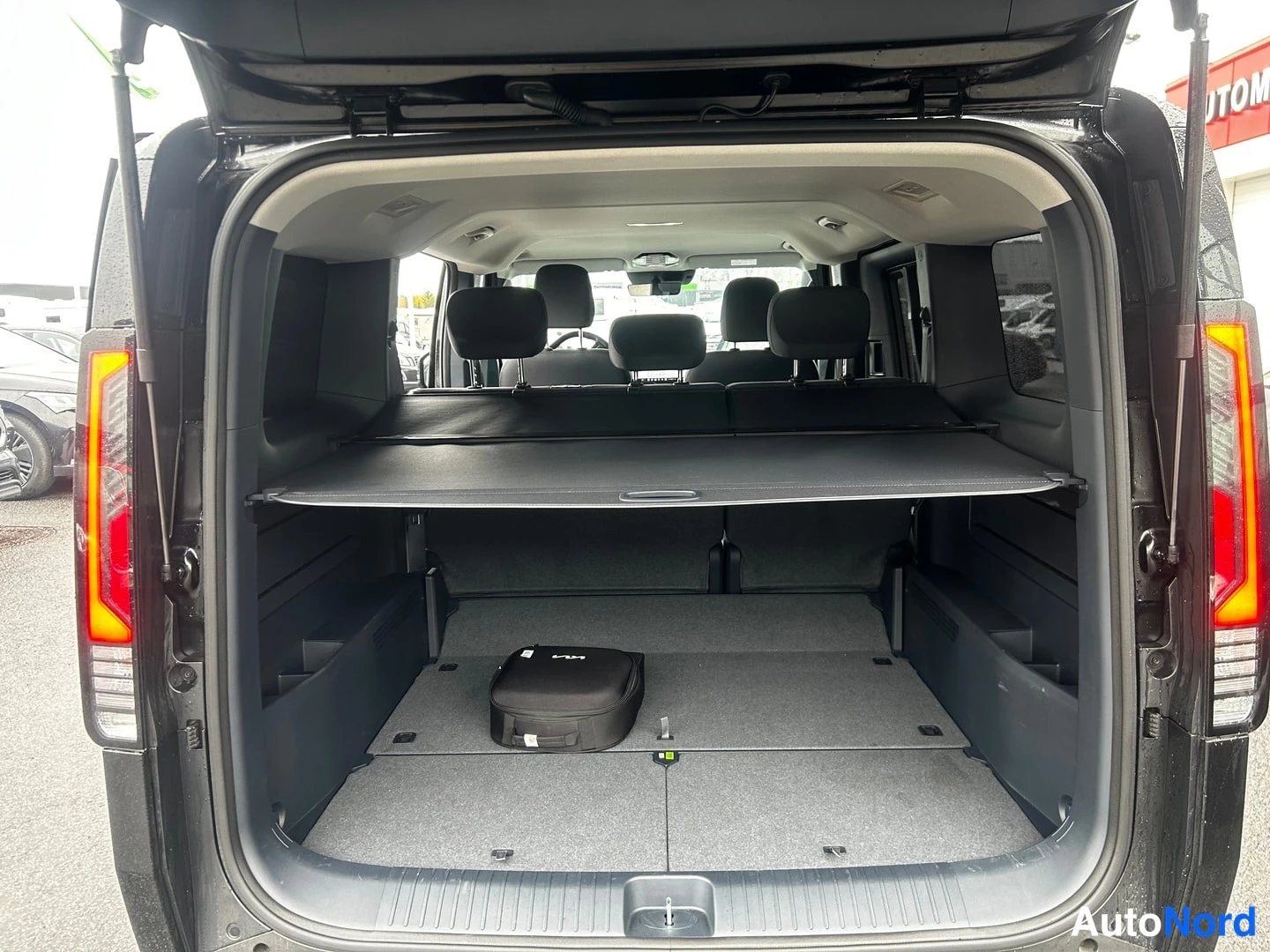 Black KIA PV5 2026, rear, photo 6