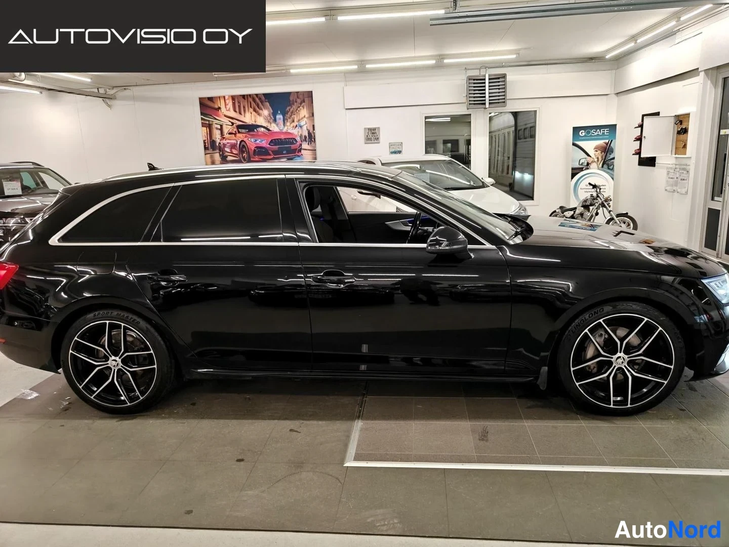 Black Audi A4 Avant 2016, side, photo 3