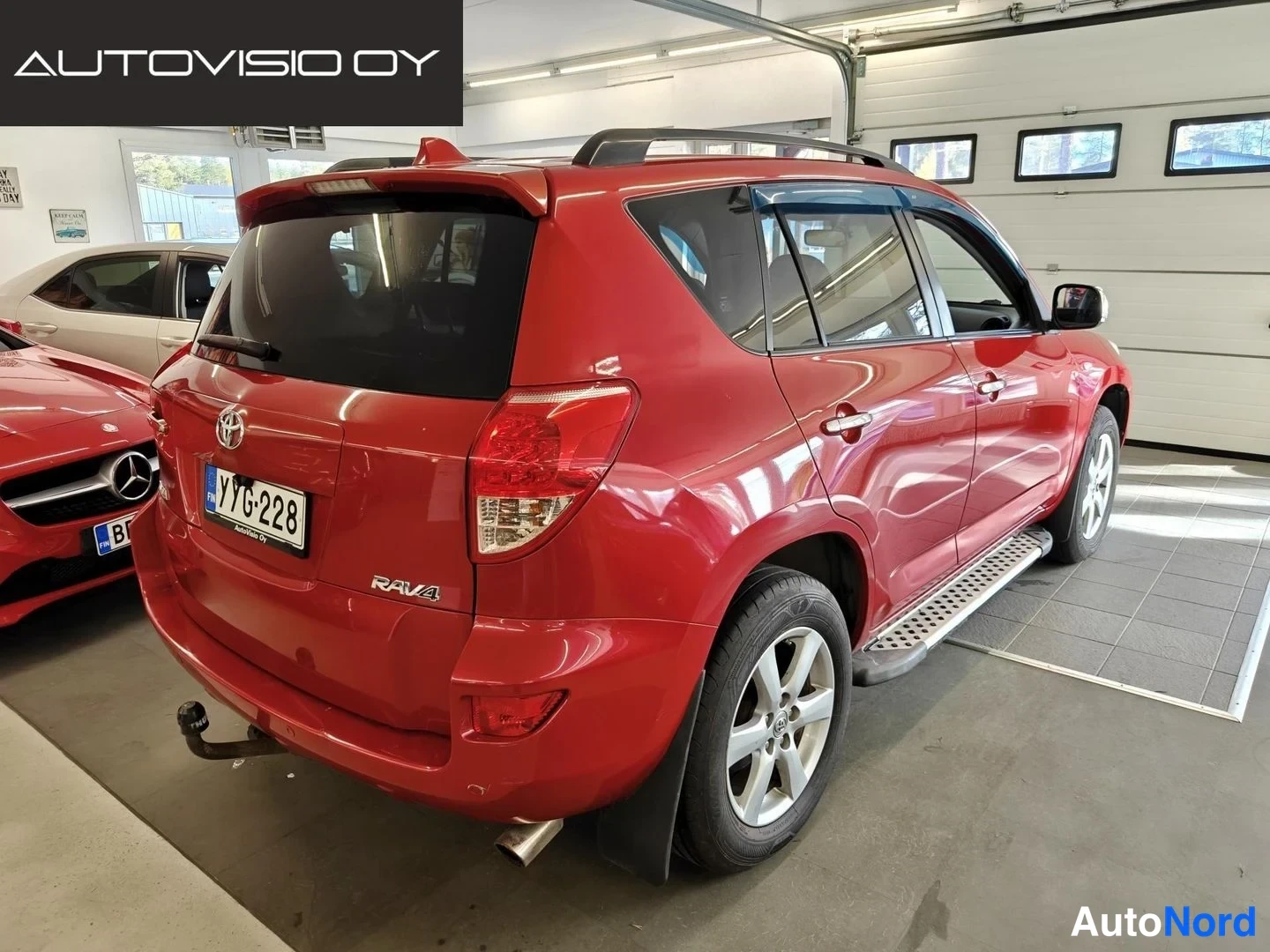 Red Toyota RAV4 2009, rear three-quarter, photo 4