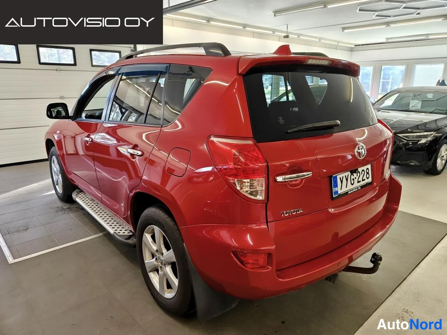 Red Toyota RAV4 2009, rear three-quarter, photo 5