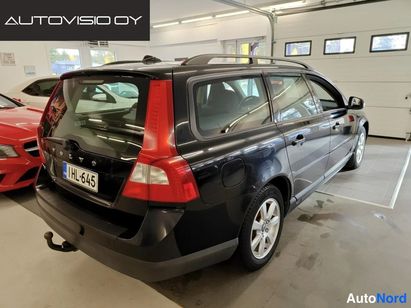 Black Volvo V70 2009, rear three-quarter, photo 5