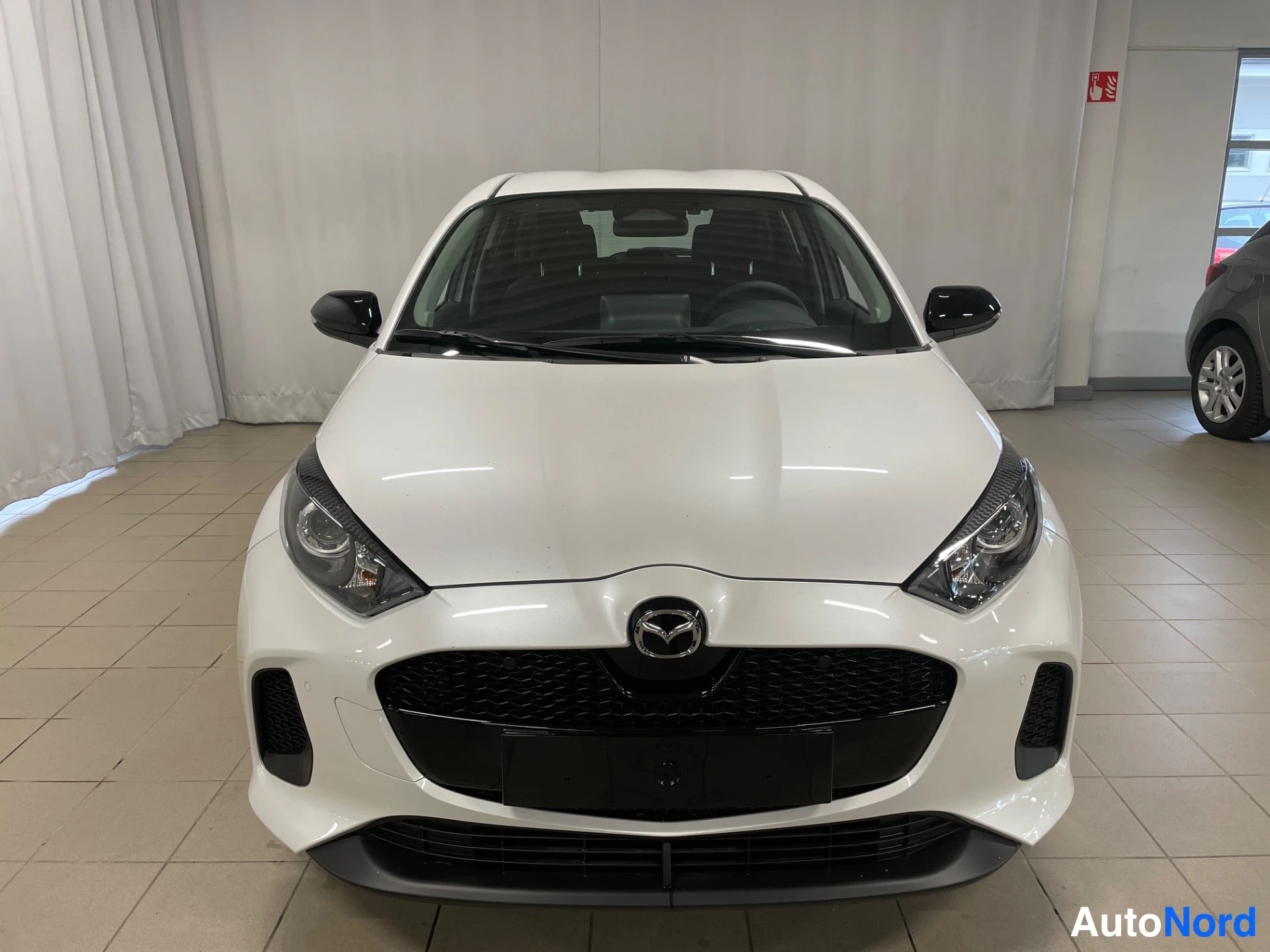 White Mazda Mazda2 Hybrid 2026, front, photo 5