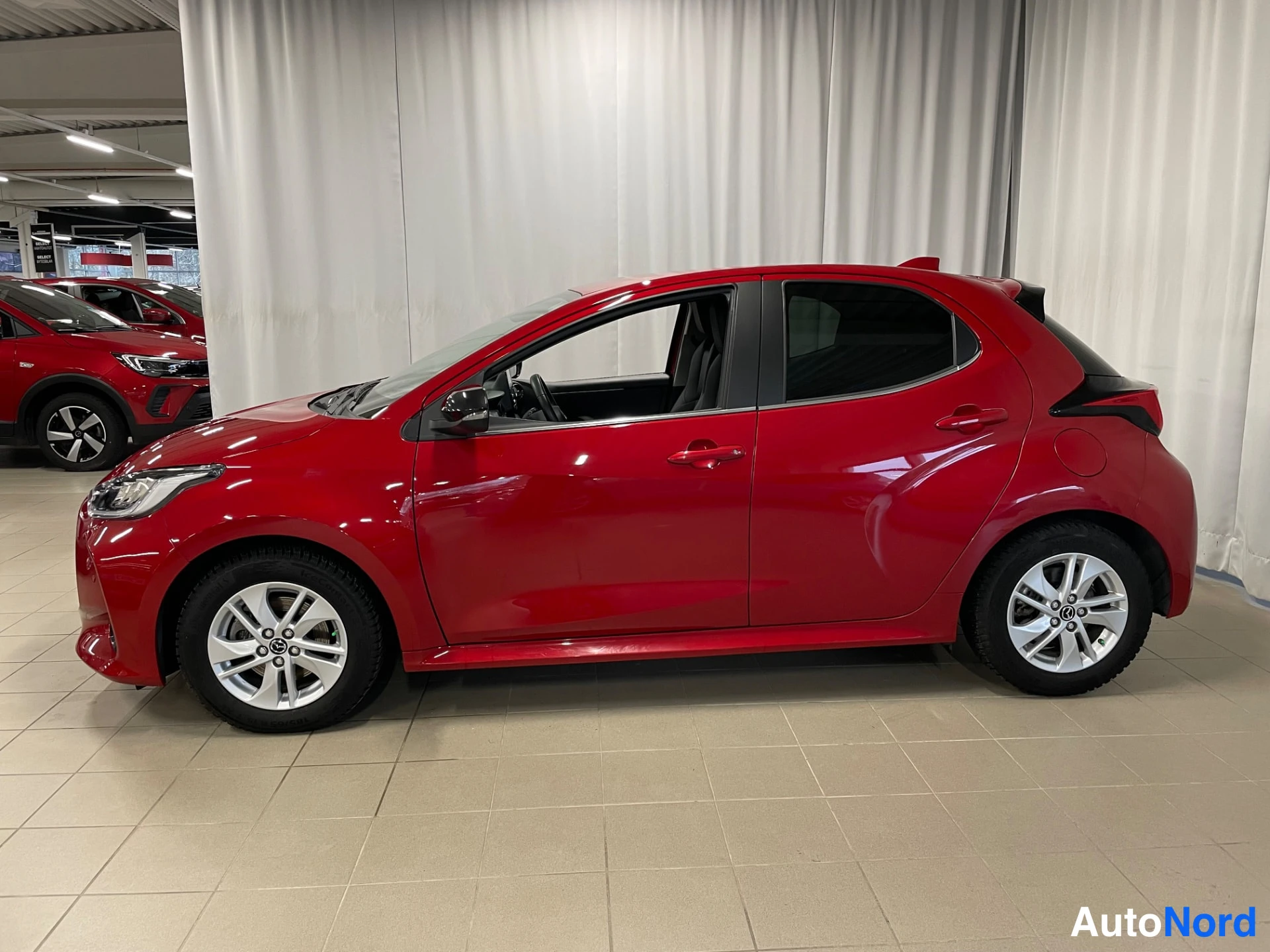 Red Mazda Mazda2 Hybrid 2023, side, photo 4
