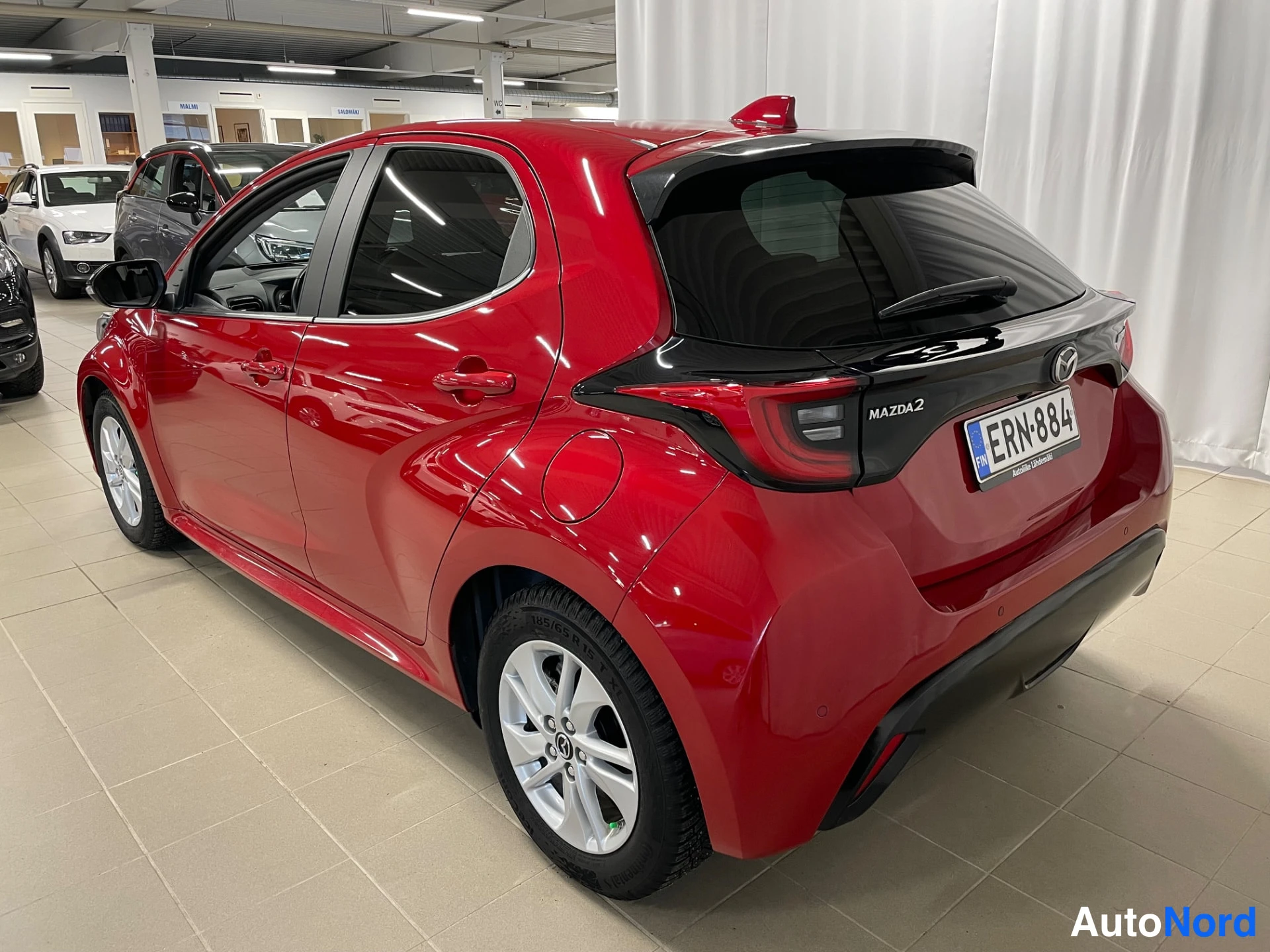 Red Mazda Mazda2 Hybrid 2023, rear three-quarter, photo 6