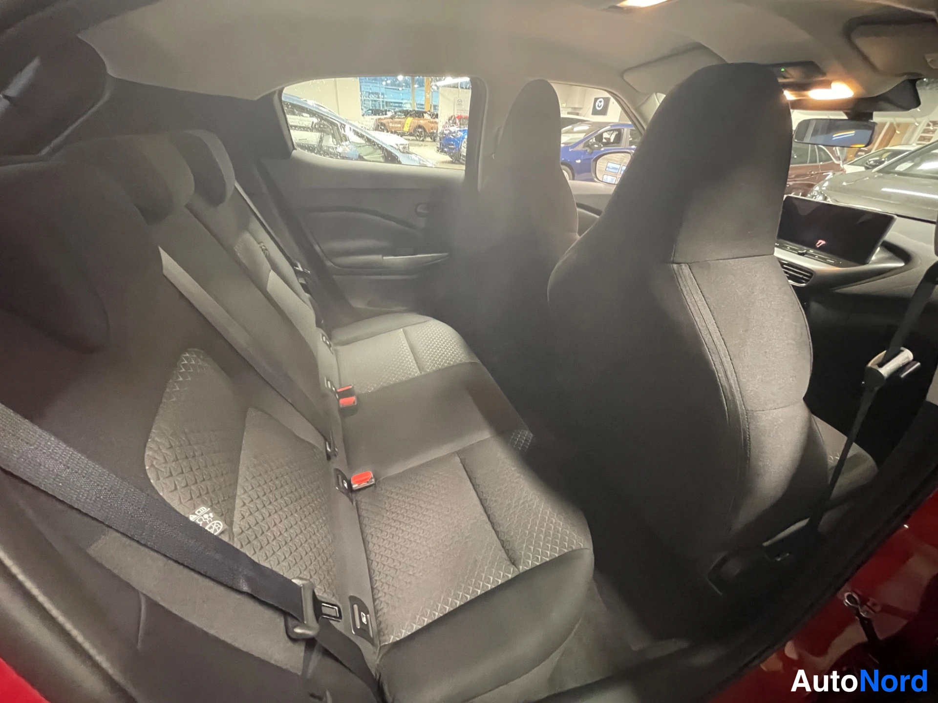 Red Nissan Juke 2026, side, photo 9