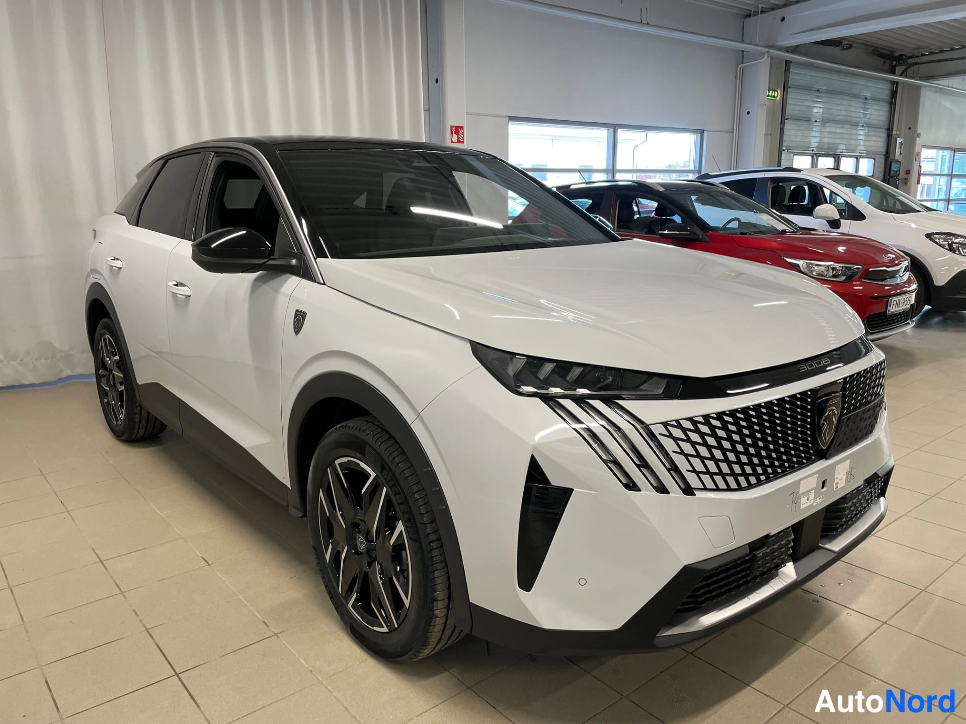 White Peugeot 3008 2026, front three-quarter, nose to the right, photo 3