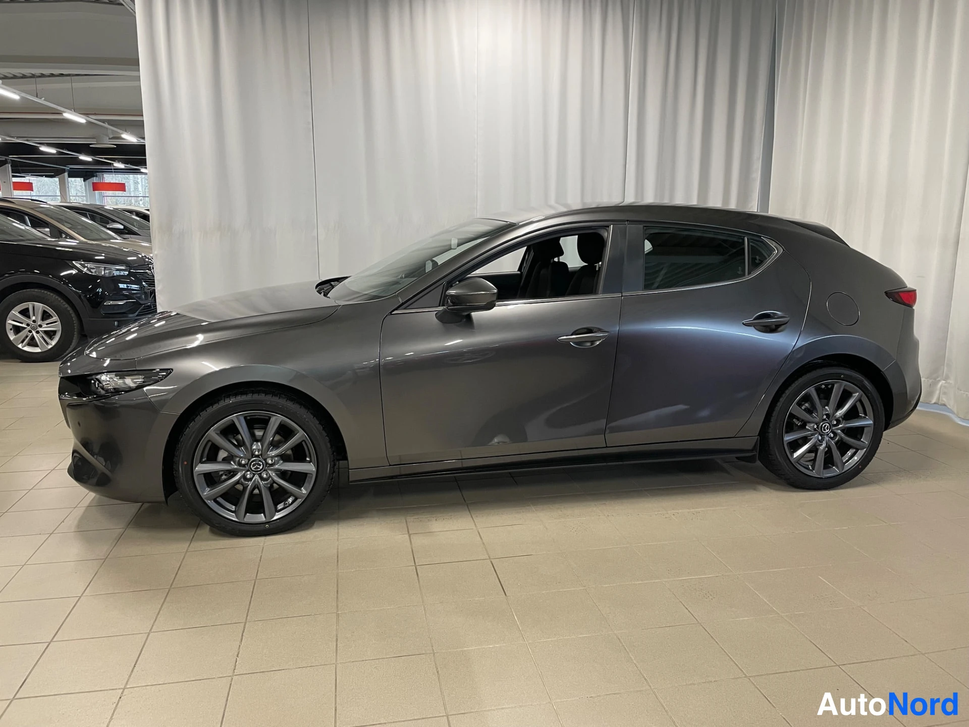 Grey Mazda Mazda3 2026, side, photo 4