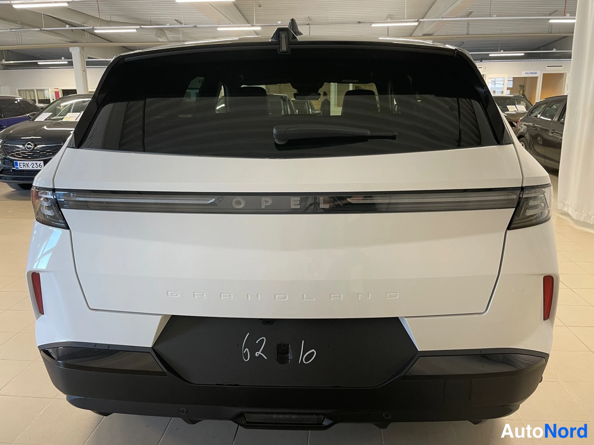 White Opel Grandland 2026, rear, photo 8