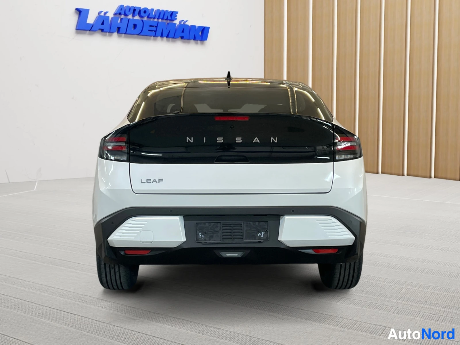 White Nissan Leaf 2026, rear, photo 8
