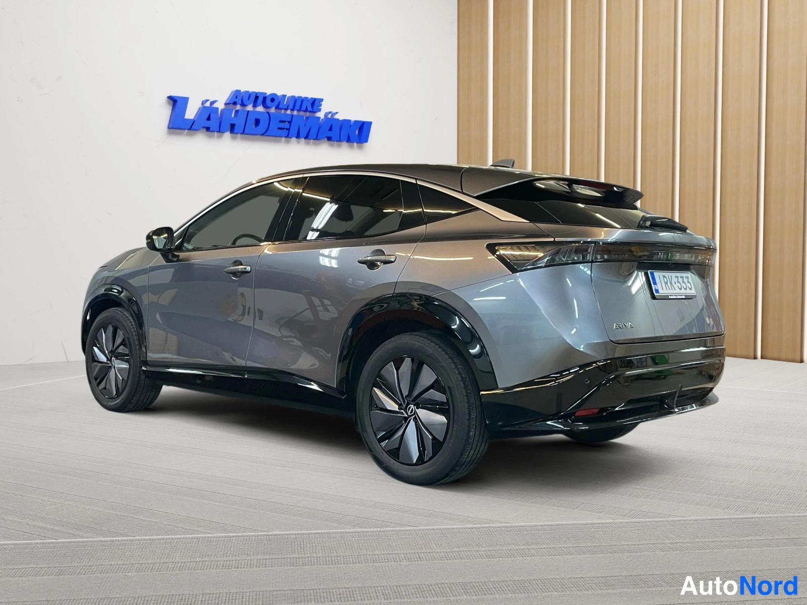 Grey Nissan Ariya 2023, rear three-quarter, photo 7