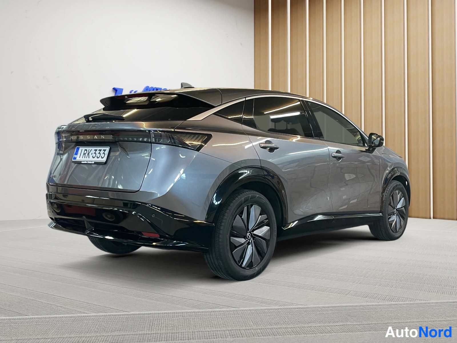 Grey Nissan Ariya 2023, rear three-quarter, photo 6