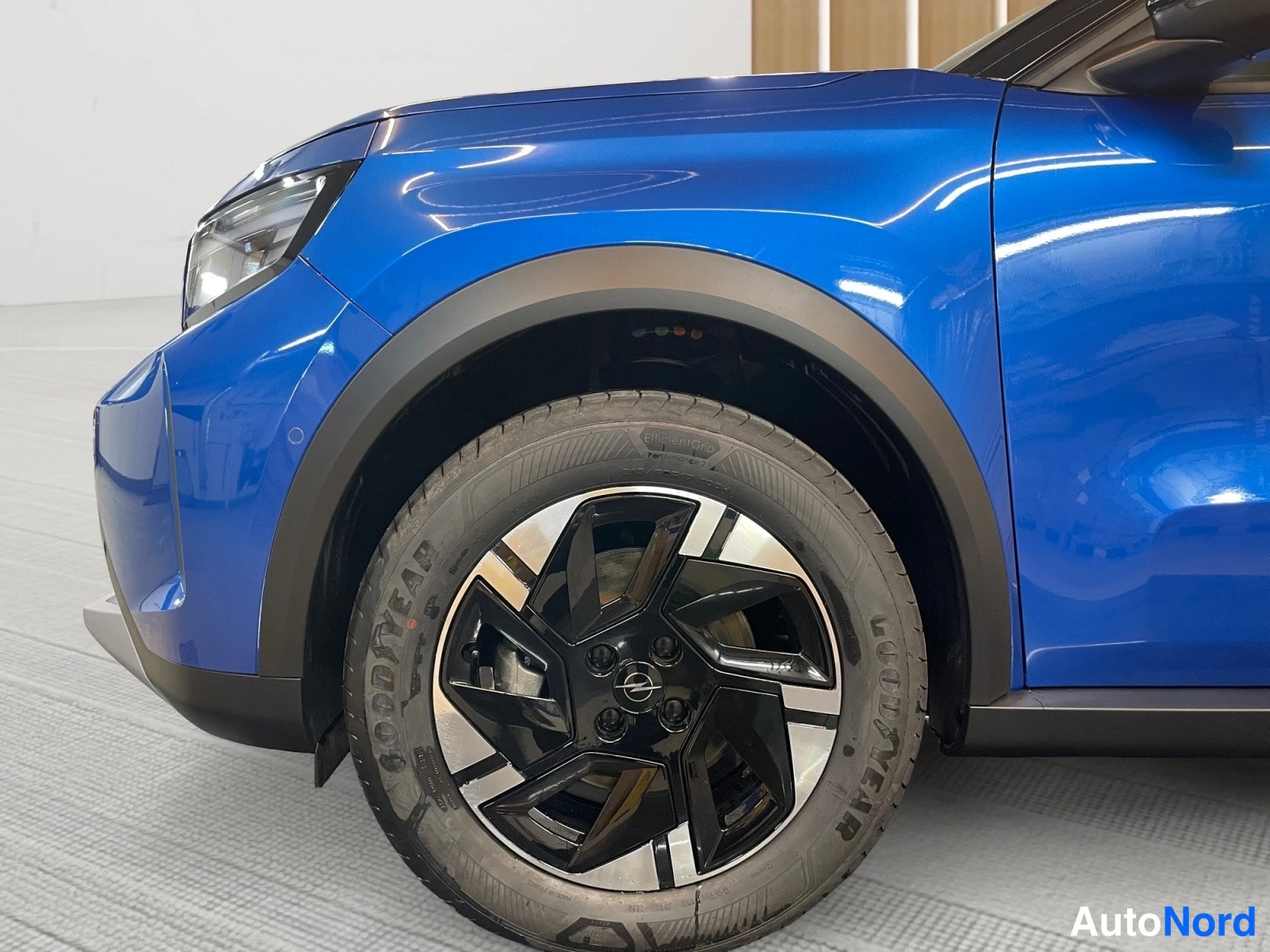 Blue Opel Frontera 2026, front three-quarter, nose to the left, photo 2