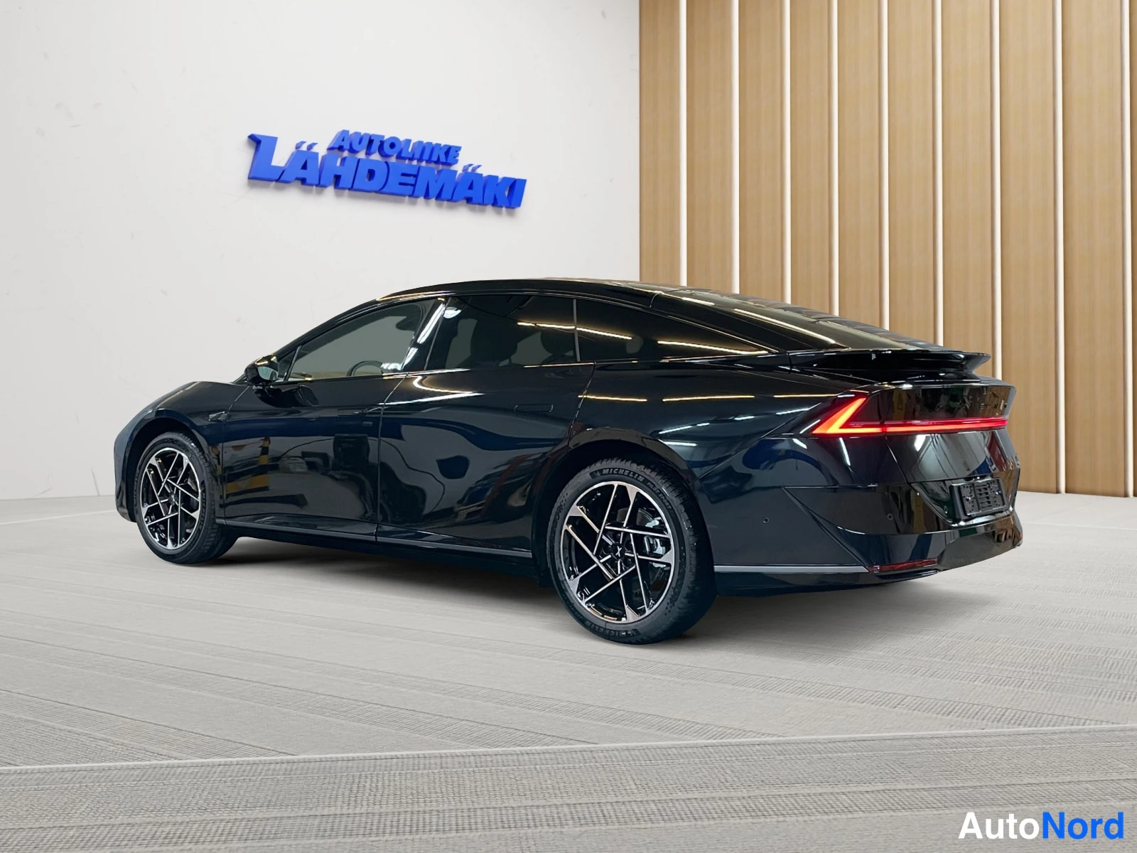 Black Xpeng P7+ 2026, rear three-quarter, photo 10