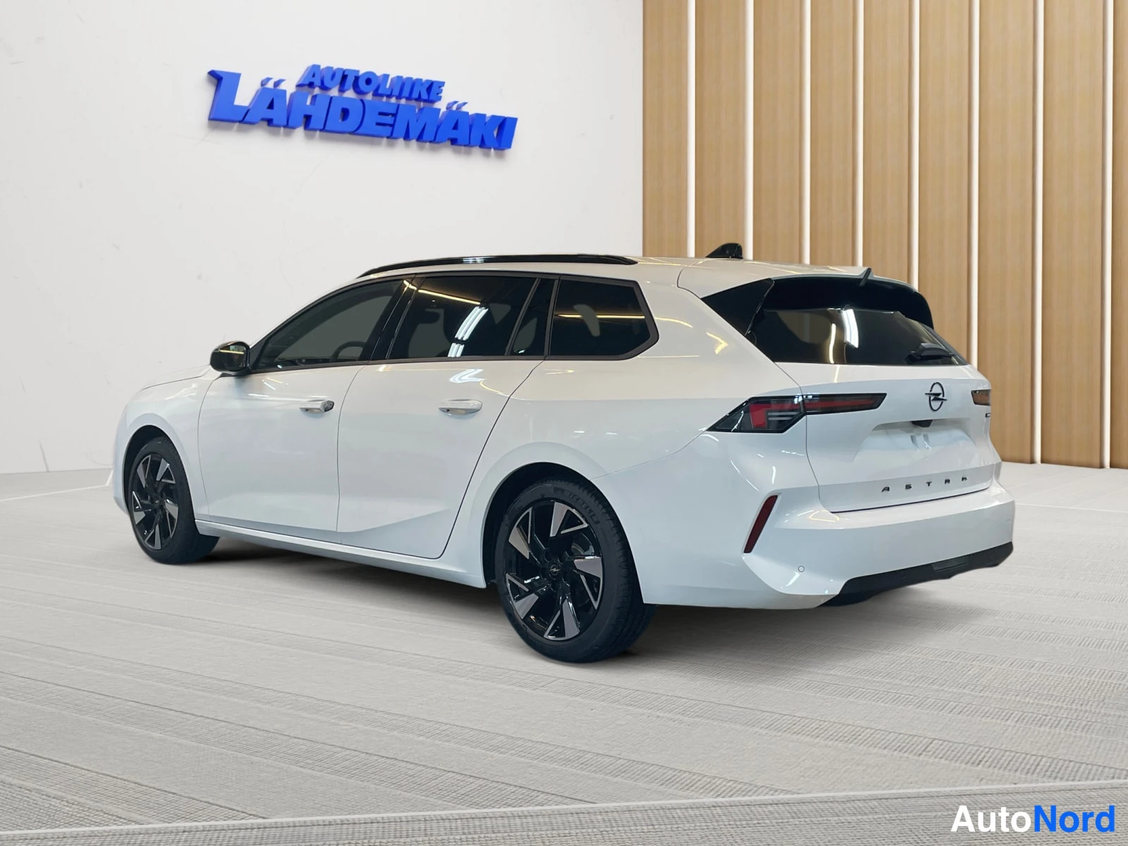 White Opel Astra 2026, rear three-quarter, photo 8
