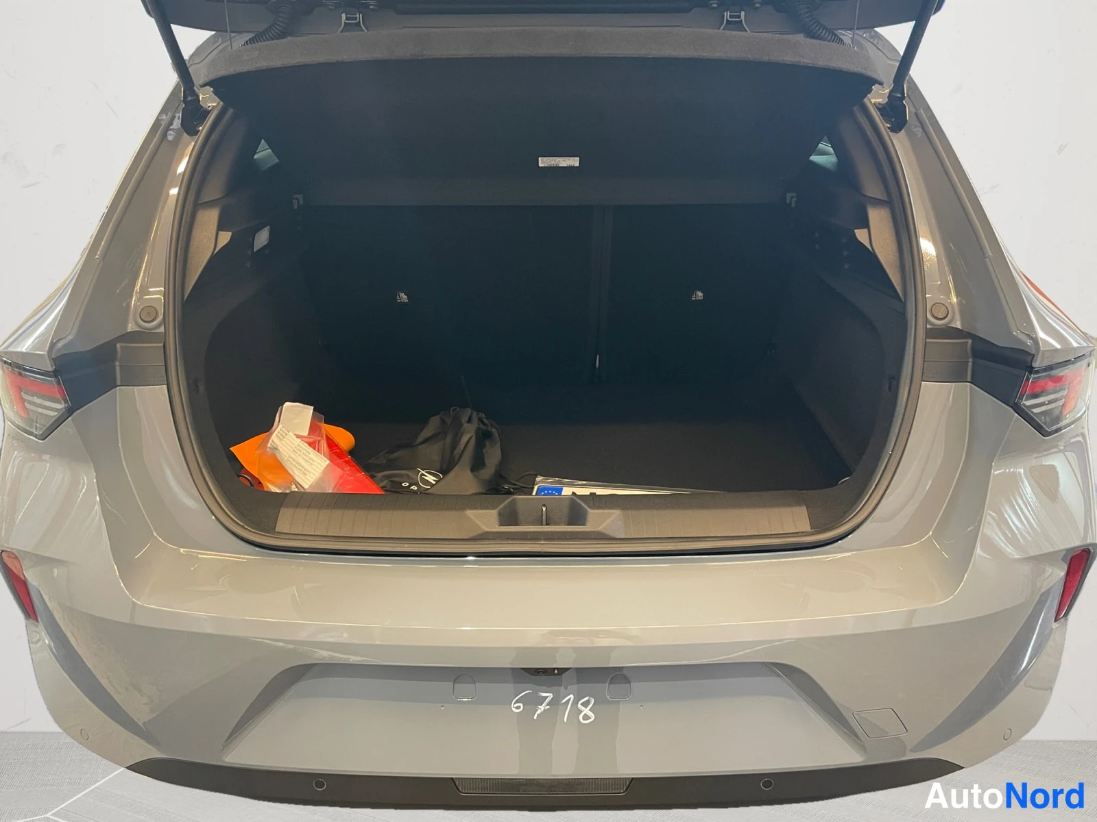 Grey Opel Astra 2026, rear, photo 10