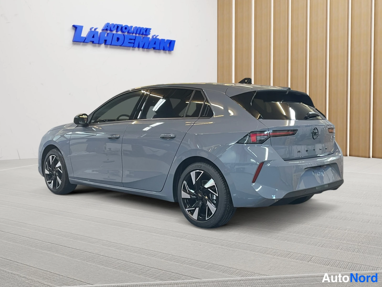 Grey Opel Astra 2026, rear three-quarter, photo 7
