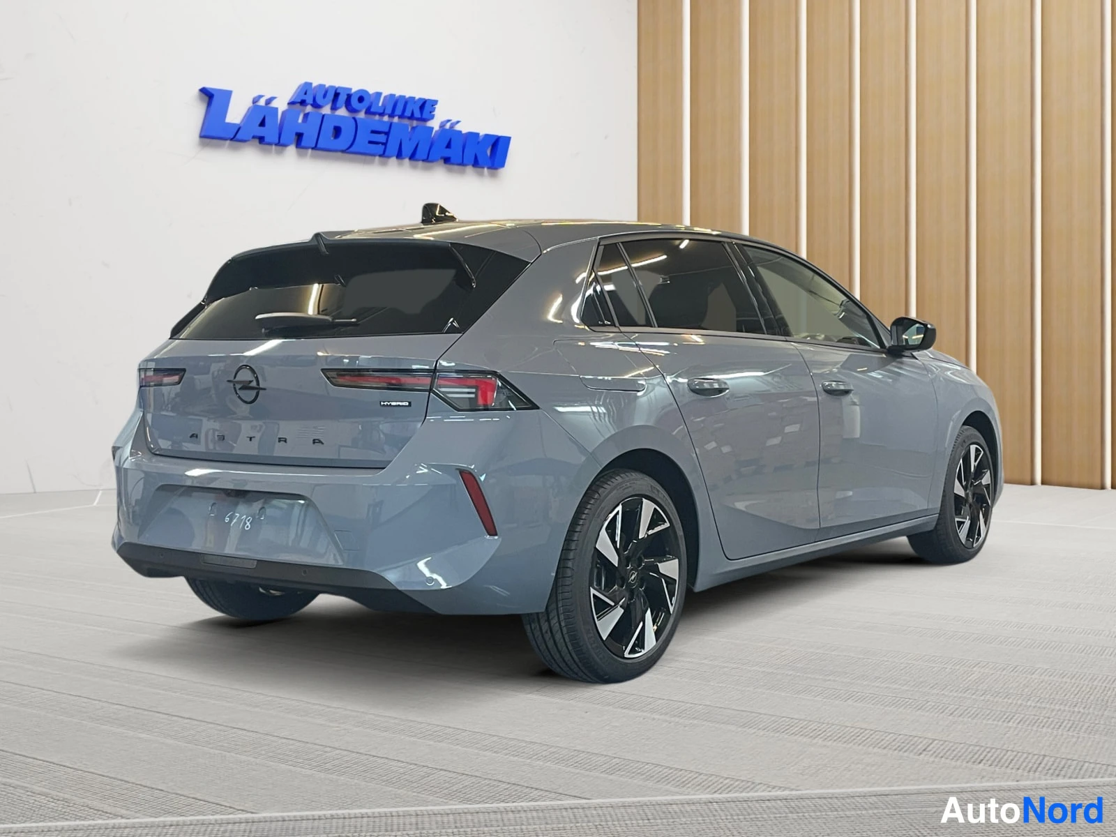 Grey Opel Astra 2026, rear three-quarter, photo 8