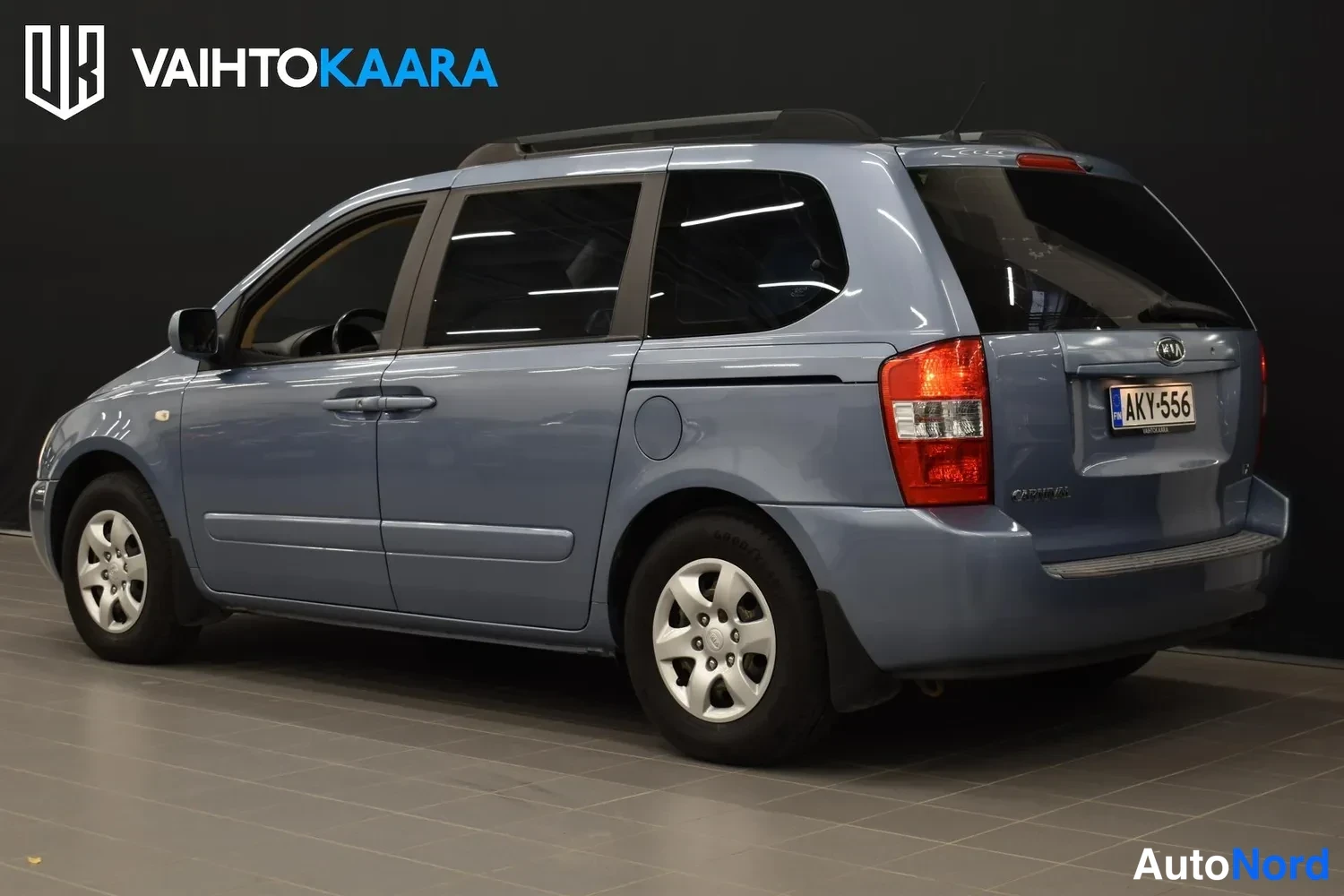 Harmaa Kia Carnival 2009, takaviisto, kuva 9