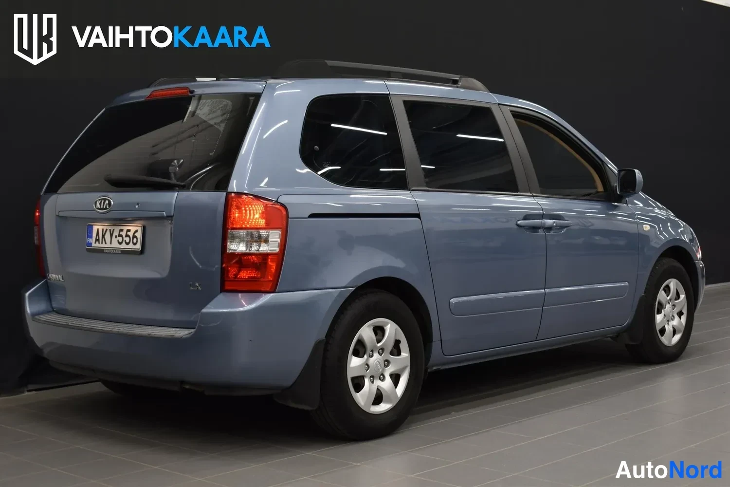 Harmaa Kia Carnival 2009, takaviisto, kuva 8