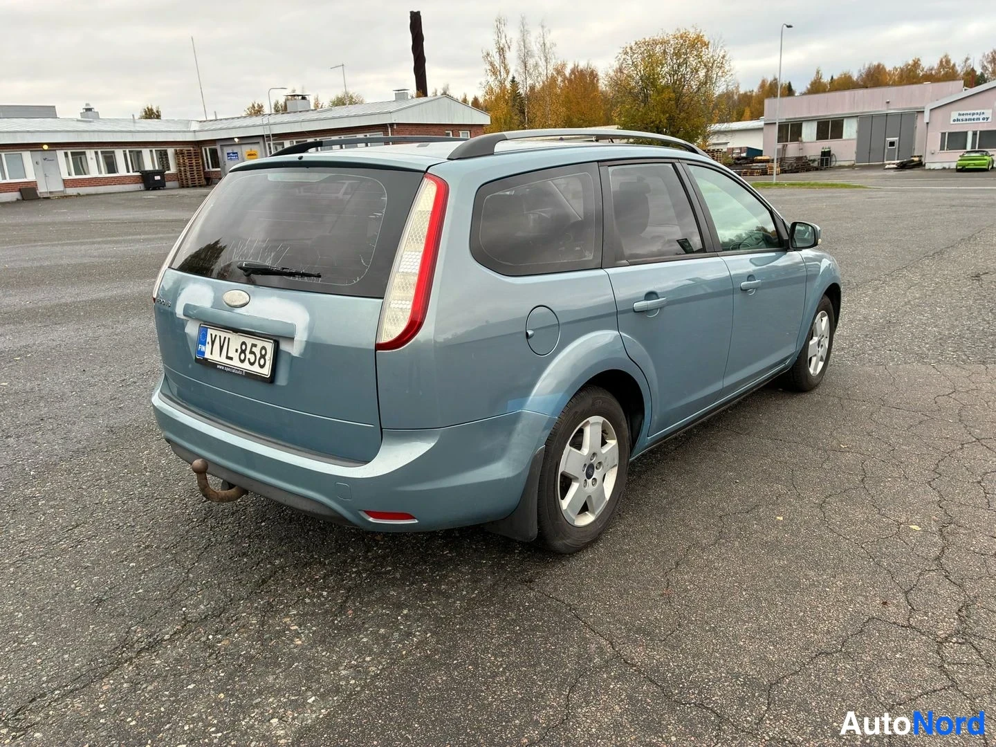 Blue Ford Focus 2009, rear three-quarter, photo 8