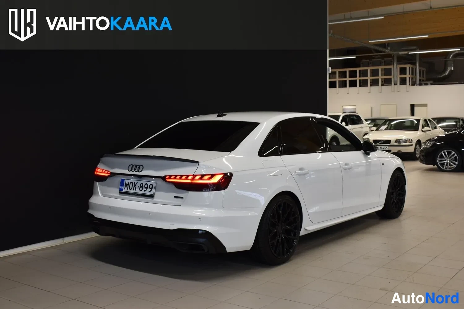 White Audi A4 2022, rear three-quarter, photo 5