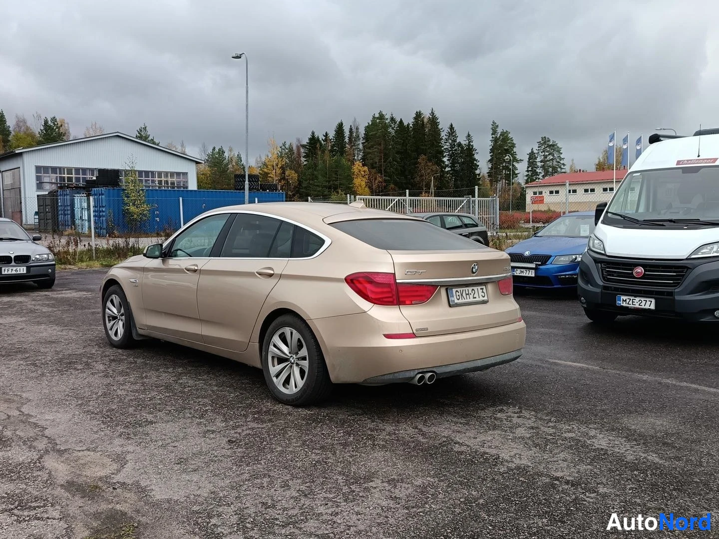 Beige BMW 530d xDrive 2011, rear three-quarter, photo 4