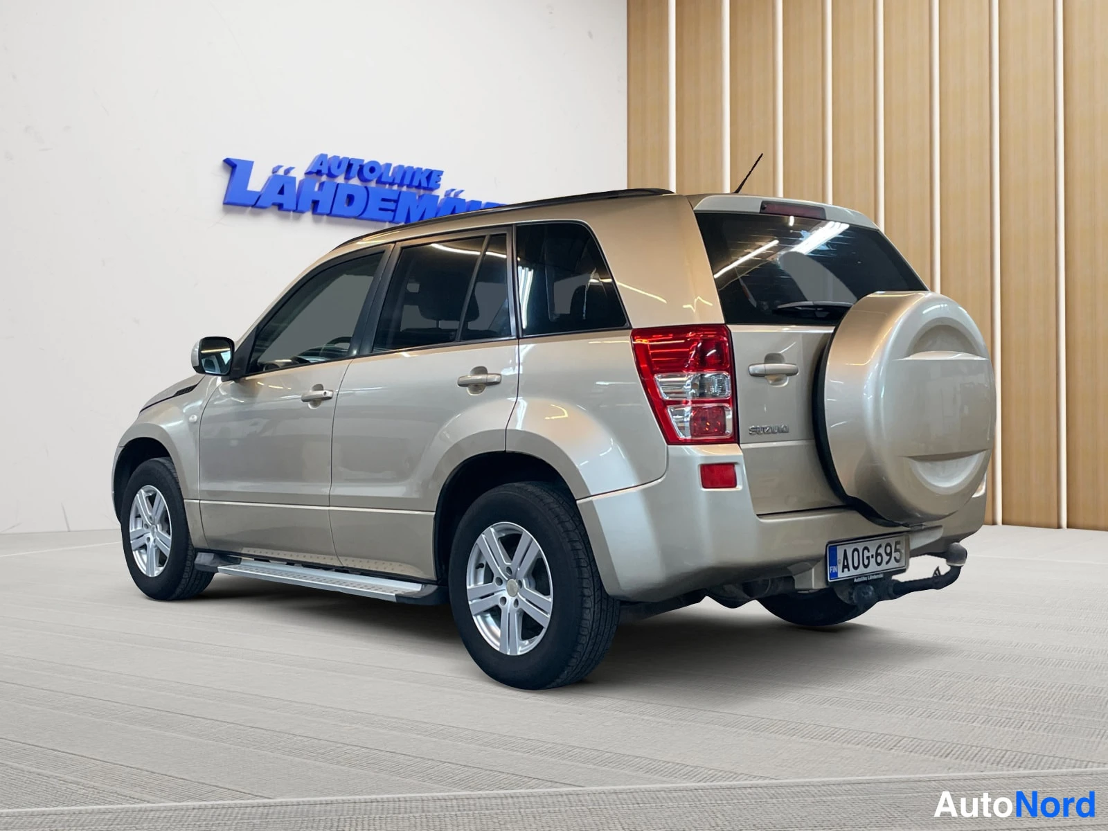 Ruskea Suzuki Grand Vitara 2007, takaviisto, kuva 7