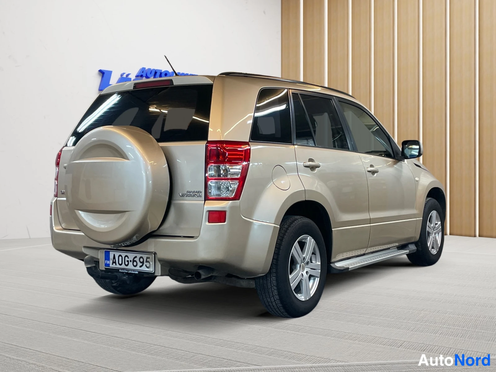 Ruskea Suzuki Grand Vitara 2007, takaviisto, kuva 8
