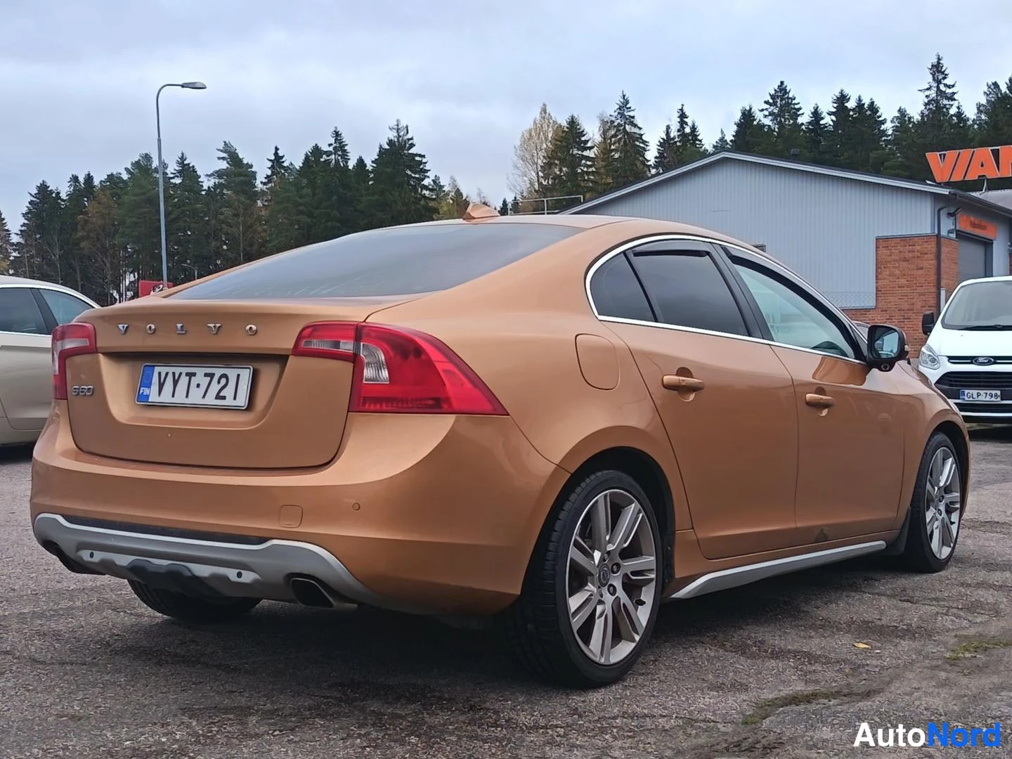 Oranssi Volvo S60 2010, takaviisto, kuva 7