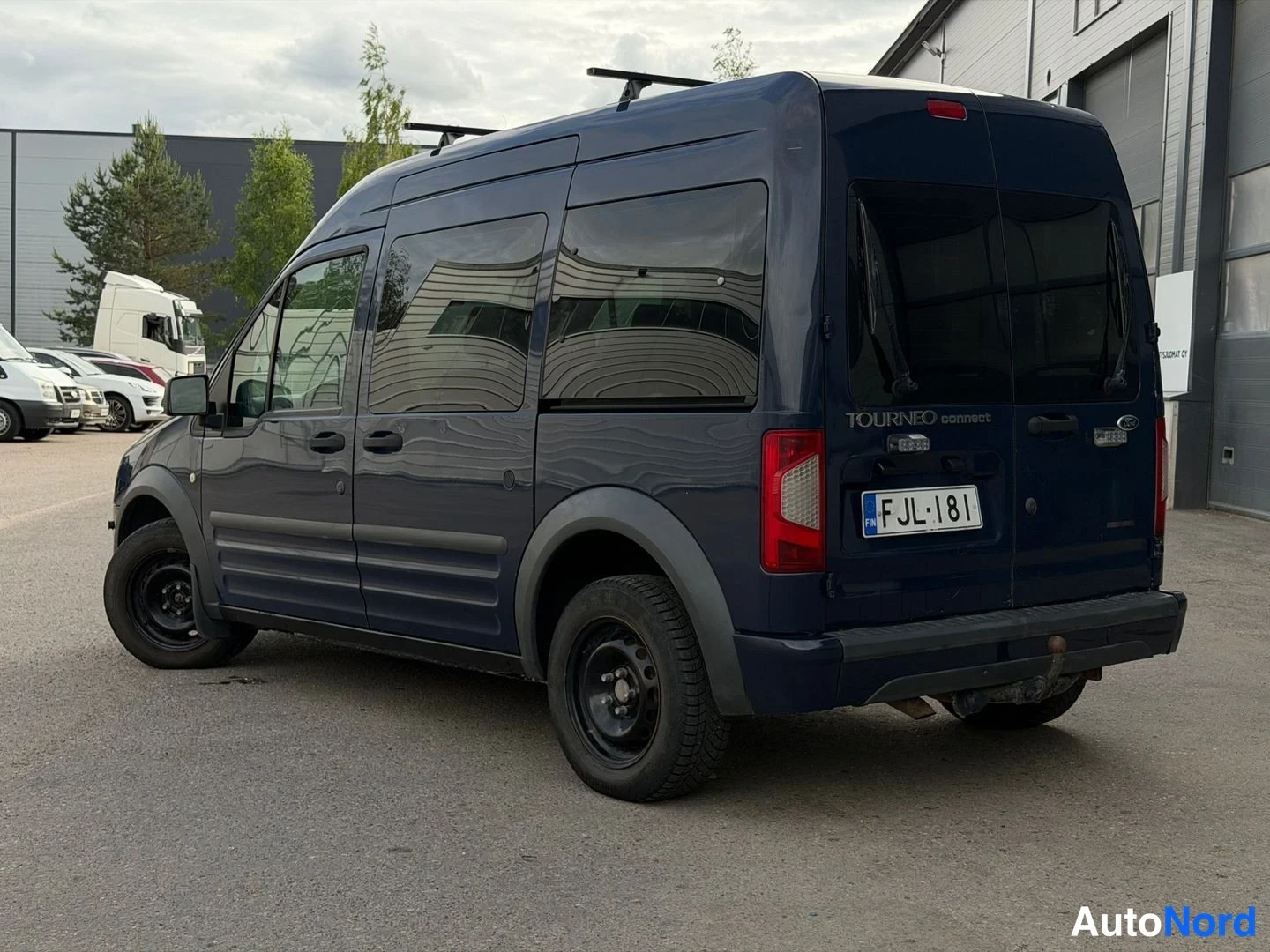 Sininen Ford Tourneo Connect 2009, takaviisto, kuva 3