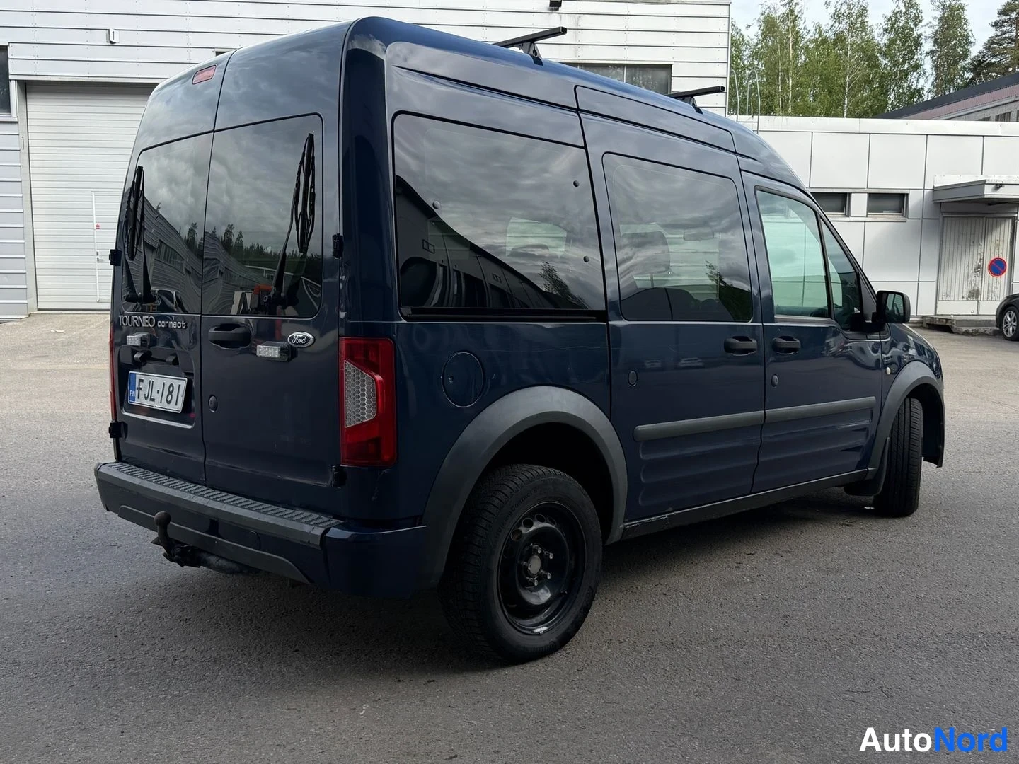 Sininen Ford Tourneo Connect 2009, takaa, kuva 4