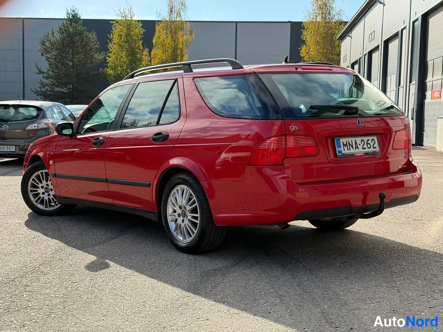 Punainen Saab 9-5 2006, takaviisto, kuva 3
