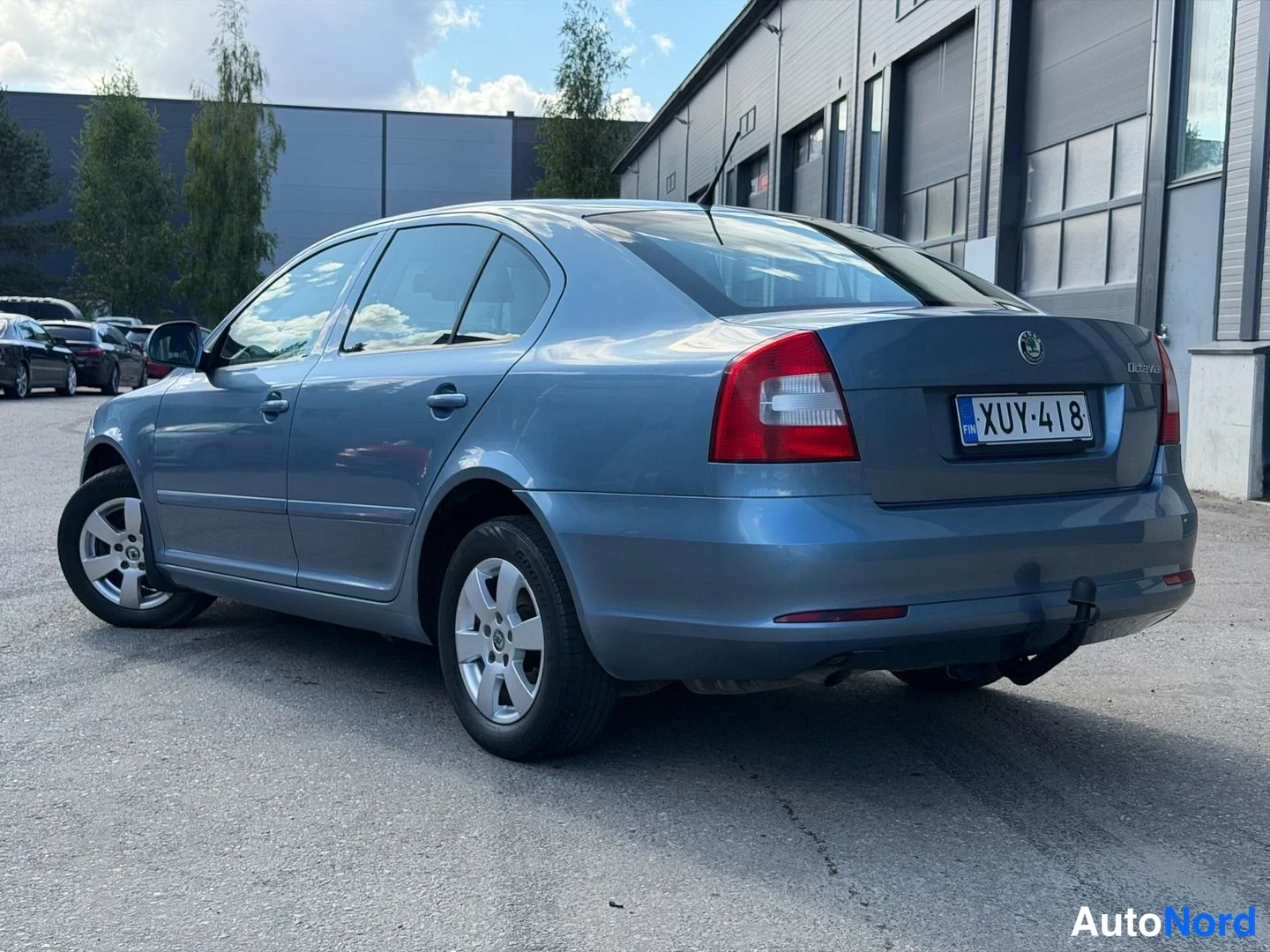 Turkoosi Skoda Octavia 2011, takaviisto, kuva 3