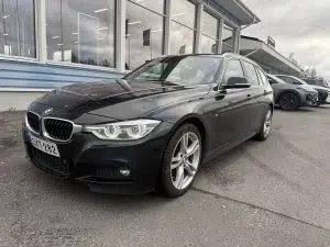 Musta BMW 320i xDrive 2019, etuviisto, keula vasemmalle, kuva 7
