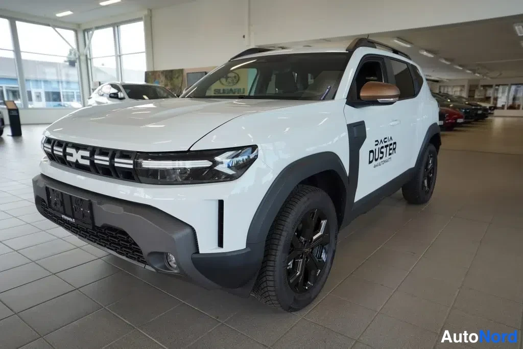 Valkoinen Dacia Duster 2026, etuviisto, keula vasemmalle, kuva 4