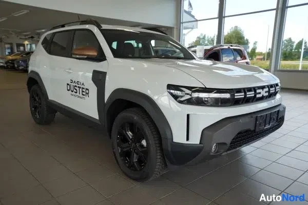 Valkoinen Dacia Duster 2026, etuviisto, keula oikealle, kuva 9