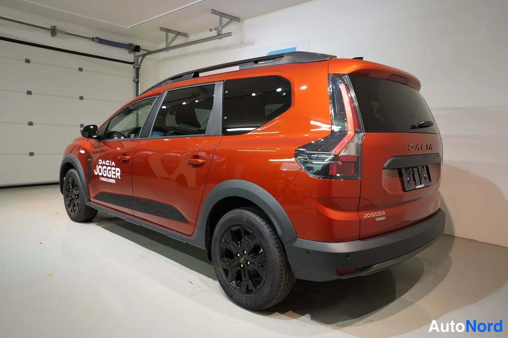 Red Dacia Jogger 2026, rear three-quarter, photo 26