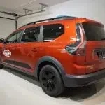 Red Dacia Jogger 2026, rear three-quarter, photo 39