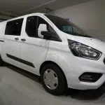 White Ford Transit Custom 2019, front three-quarter, nose to the right, photo 9