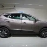 Ruskea Hyundai ix35 2014, sivulta, kuva 4