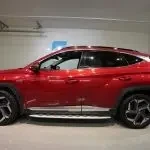Punainen Hyundai Tucson 2021, sivulta, kuva 8
