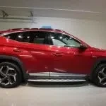 Punainen Hyundai Tucson 2021, sivulta, kuva 5
