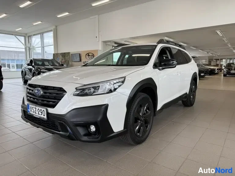 White Subaru Outback 2021, front three-quarter, nose to the left, photo 6