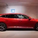 Punainen Volkswagen Arteon 2021, sivulta, kuva 12